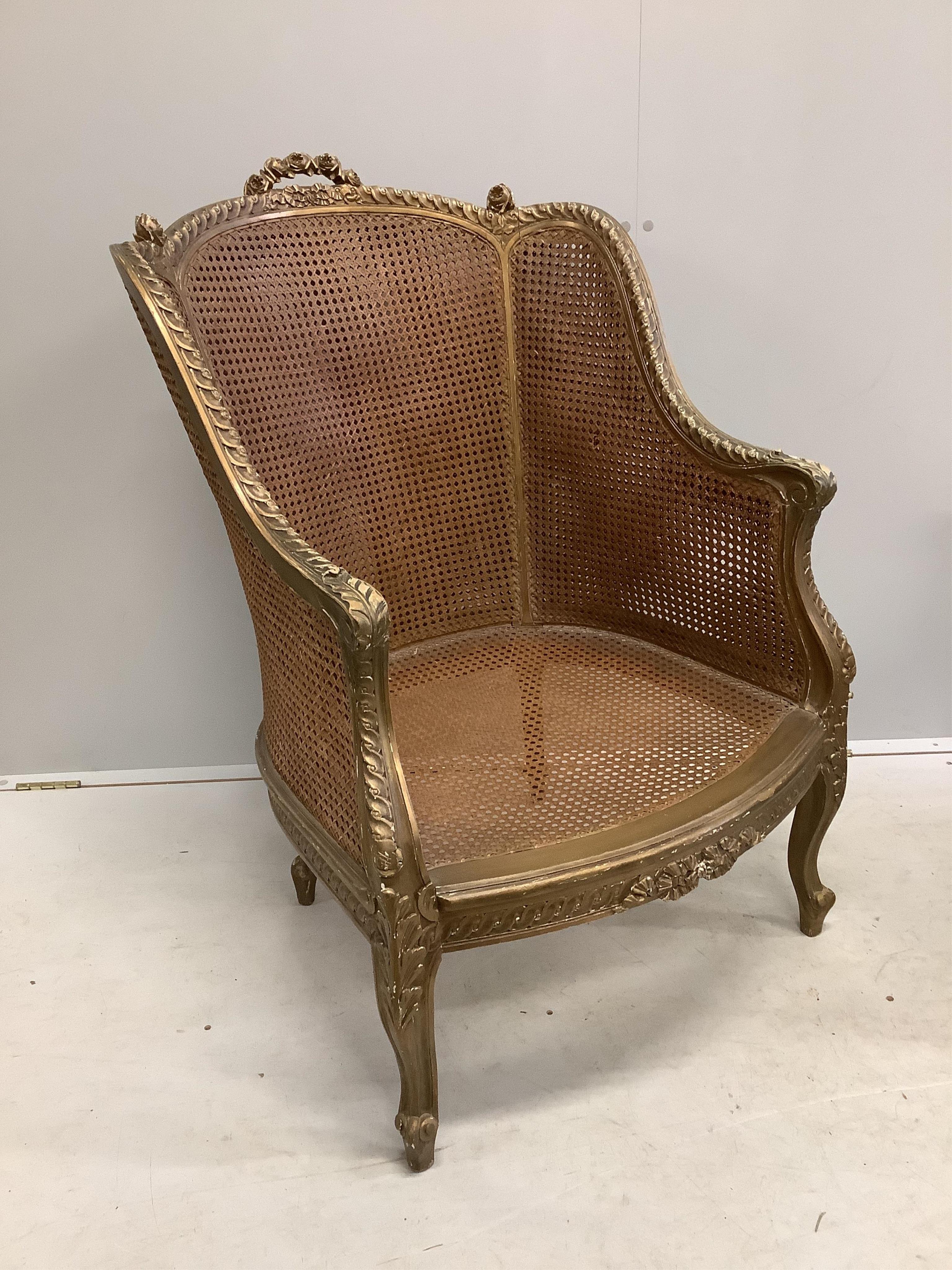 Two Louis XVI style giltwood armchairs, larger width 68cm, depth 72cm, height 100cm. Condition - fair